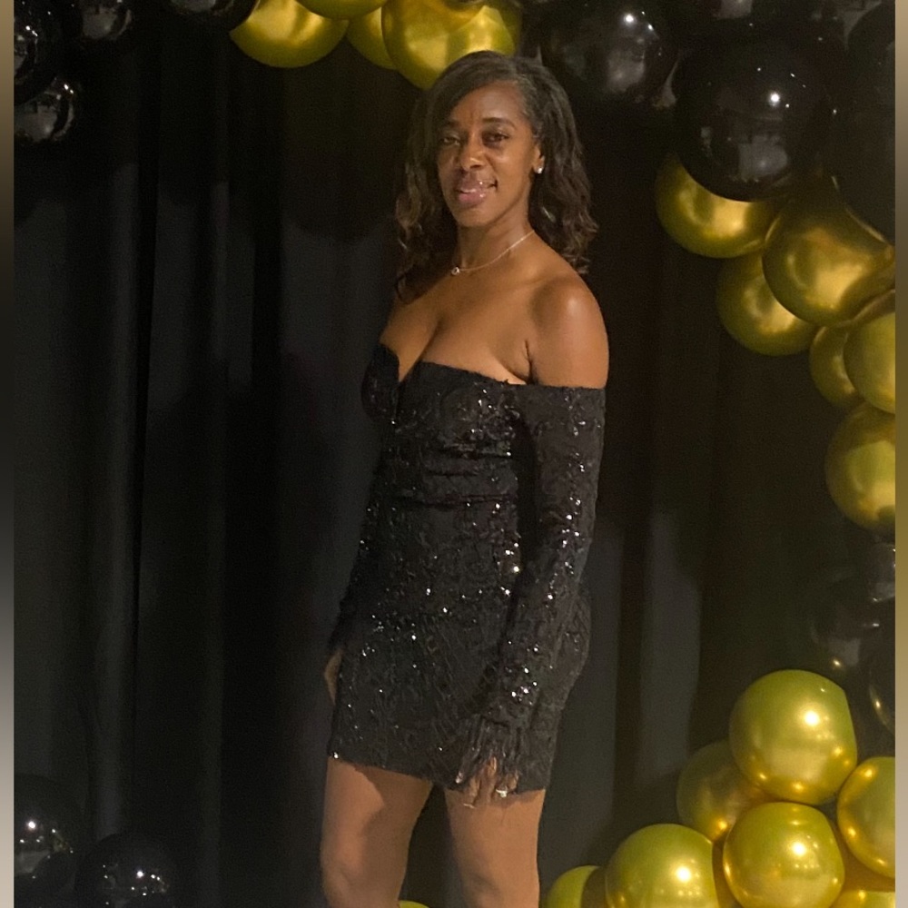 Cocktail dress, very classy.  Sequins, off shoulder